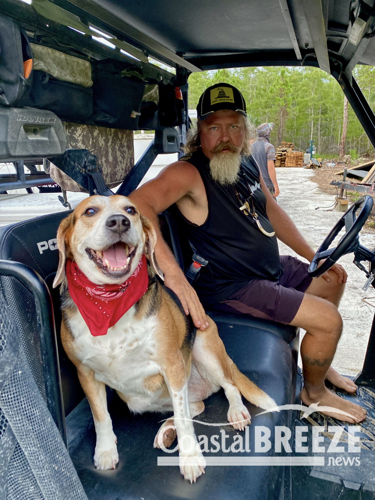6. Dusty Crum with his beloved beagle Riley, Florida’s finest python tracking beagle, says Crum..JPG